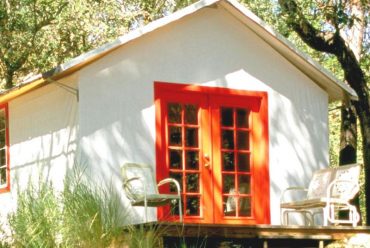 Painted door and trim gives this bungalow a finished look.